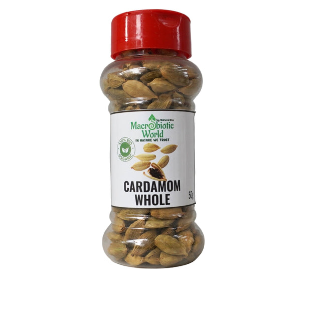 Bottle of cardamom whole with a red lid on a gray background