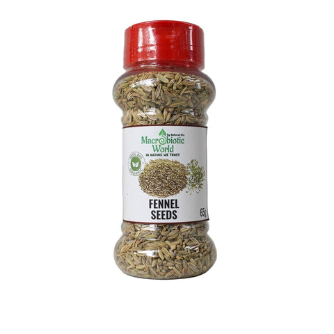 Jar of fennel seeds with a red lid on a gray background