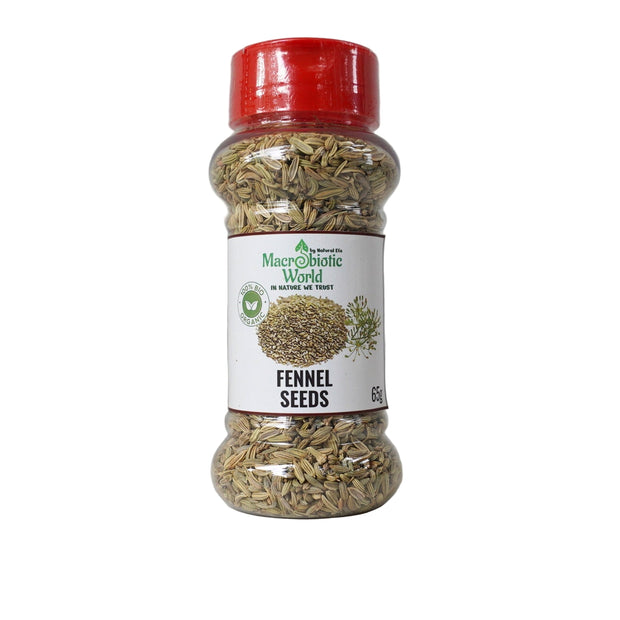 Jar of fennel seeds with a red lid on a gray background