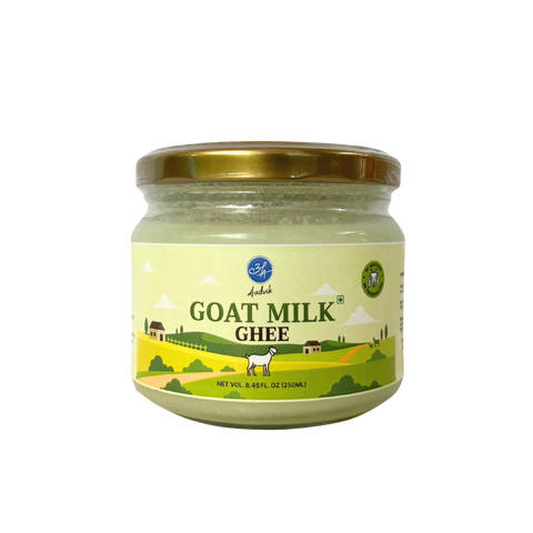 Jar of goat milk ghee with a gold lid on a white background