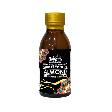 Bottle of Macrobiotic World Almond Oil on a white background