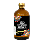 Bottle of almond oil with a colorful label on a white background