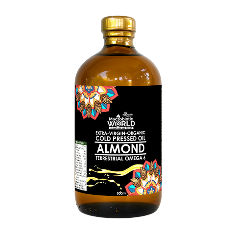 Bottle of almond oil with a colorful label on a white background