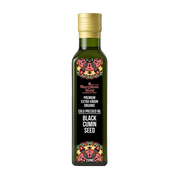 Bottle of Black Cumin Seed oil with decorative label on a white background