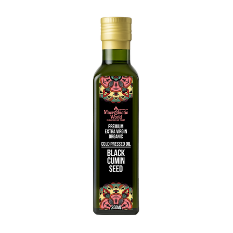 Bottle of Black Cumin Seed oil with decorative label on a white background