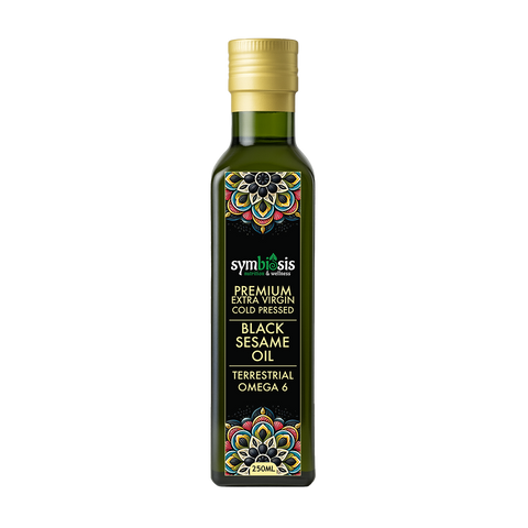 Bottle of Symbiosis Black Sesame Oil on a white background