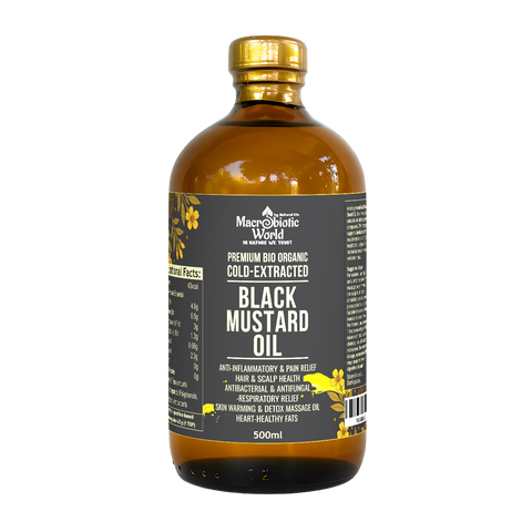 Bottle of Macrobiotic World Black Mustard Oil with a gold cap on a white background