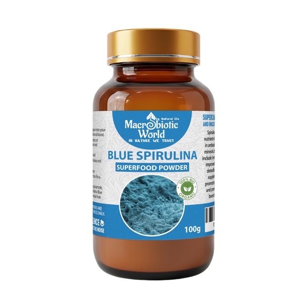 Bottle of Blue Spirulina superfood powder with a gold cap on a white background