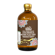 Bottle of extra-virgin organic cold pressed oil with a decorative label on a white background