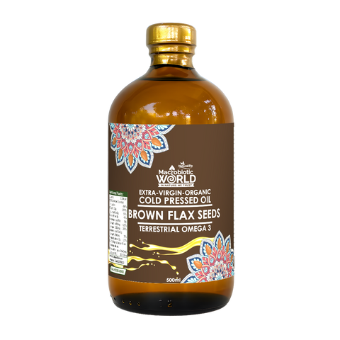 Bottle of extra-virgin organic cold pressed oil with a decorative label on a white background