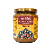 Jar of Symbiosis Almond Butter with decorative label on a white background