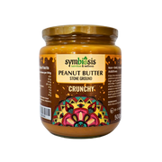 Jar of Symbiosis peanut butter with decorative label on a white background