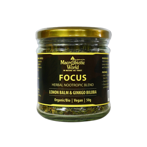 Jar of 'Focus' herbal nootropic blend with a black label on a black background