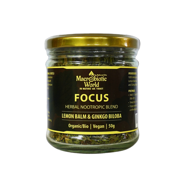 Jar of 'Focus' herbal nootropic blend with a black label on a black background