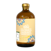 Bottle of hazelnut oil with a colorful label on a white background