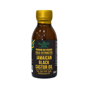 Bottle of Jamaican Black Castor Oil with a gold cap on a white background