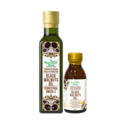 Two bottles of Black Walnuts Oil from Macrobiotic World on a white background