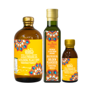 Three bottles of Golden Flaxseed oil with colorful labels on a white background