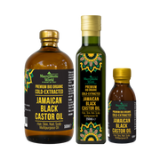 Three bottles of Jamaican Black Castor Oil from Macrobiotic World on a white background