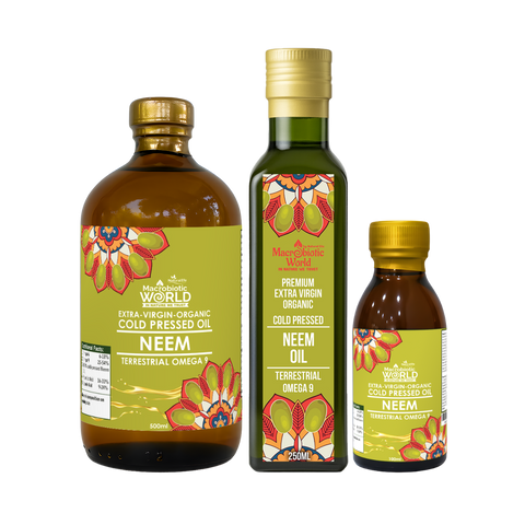 Three bottles of Manthan World Neem oil on a white background