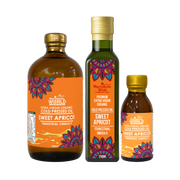 Three bottles of Sweet Apricot oil from Macrobiotic World on a white background