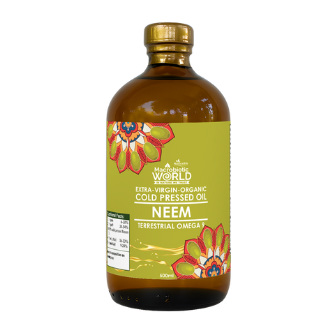 Bottle of Macrobiotic World Neem oil on a white background