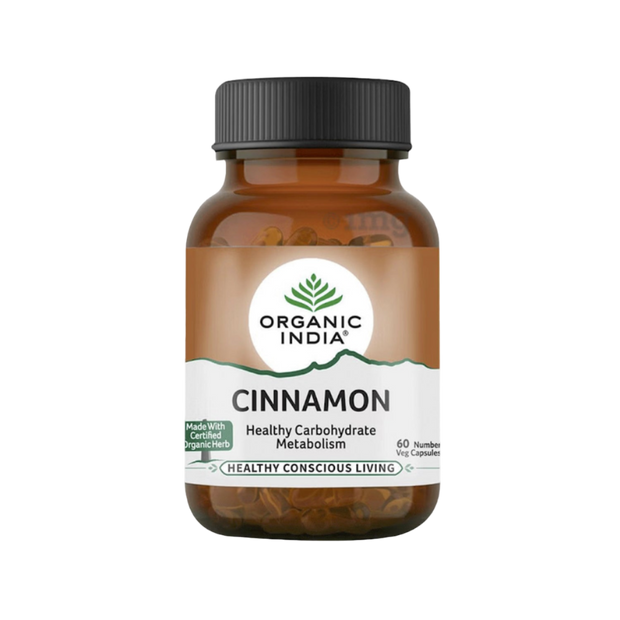 Bottle of Organic India Cinnamon capsules on a white background