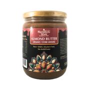 Jar of almond butter with decorative label on a white background