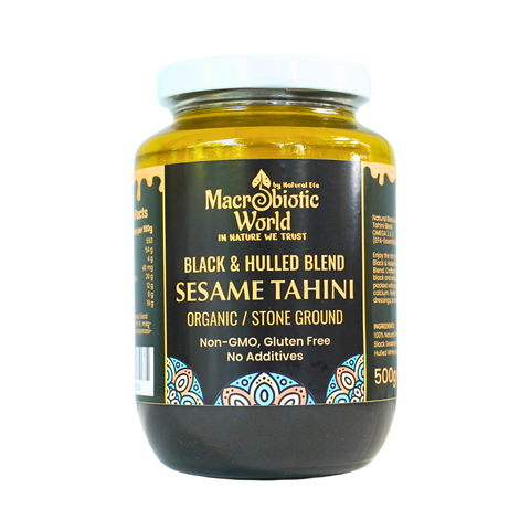 Jar of Macrobiotic World Black & Hulled Blend Sesame Tahini on a white background