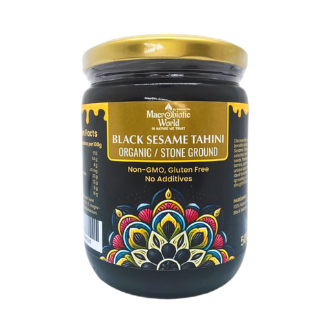 Jar of Black Sesame Tahini with decorative label on a white background