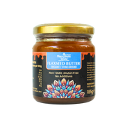 Jar of flaxseed butter with decorative label on a white background