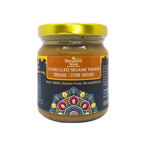 Jar of Maaveed Unhulled Sesame Tahini with decorative label on a white background