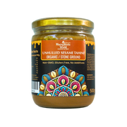 Jar of unhulled sesame tahini with colorful label on a white background