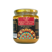 Jar of walnut butter with decorative label on a white background