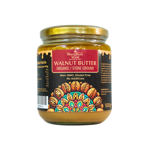 Jar of walnut butter with decorative label on a white background