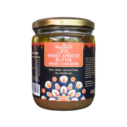 Jar of Sweet Apricot Butter with a colorful label on a white background