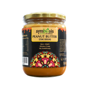 Jar of Symbiosis peanut butter with decorative label on a white background