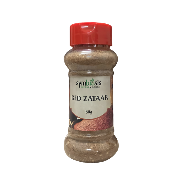 Bottle of Red Zataar spice with a red lid on a white background