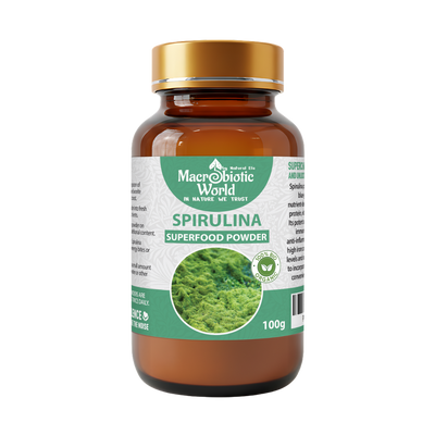 Spirulina superfood powder bottle with a gold cap on a white background