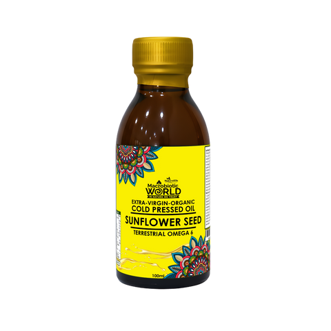 Bottle of sunflower seed oil with a yellow label on a white background