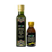 Two bottles of Symbiosis Black Sesame Oil on a white background