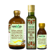 Three bottles of Symbiosis pecan oil on a white background