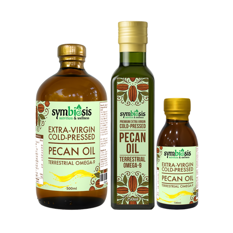 Three bottles of Symbiosis pecan oil on a white background