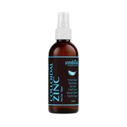 Brown spray bottle of colloidal zinc with white cap on a white background