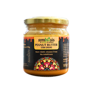 Jar of Symbiosis peanut butter with a colorful label on a white background