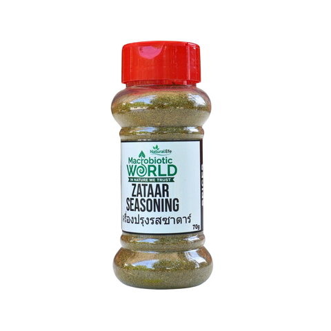 Bottle of Zataar seasoning with a red cap on a white background